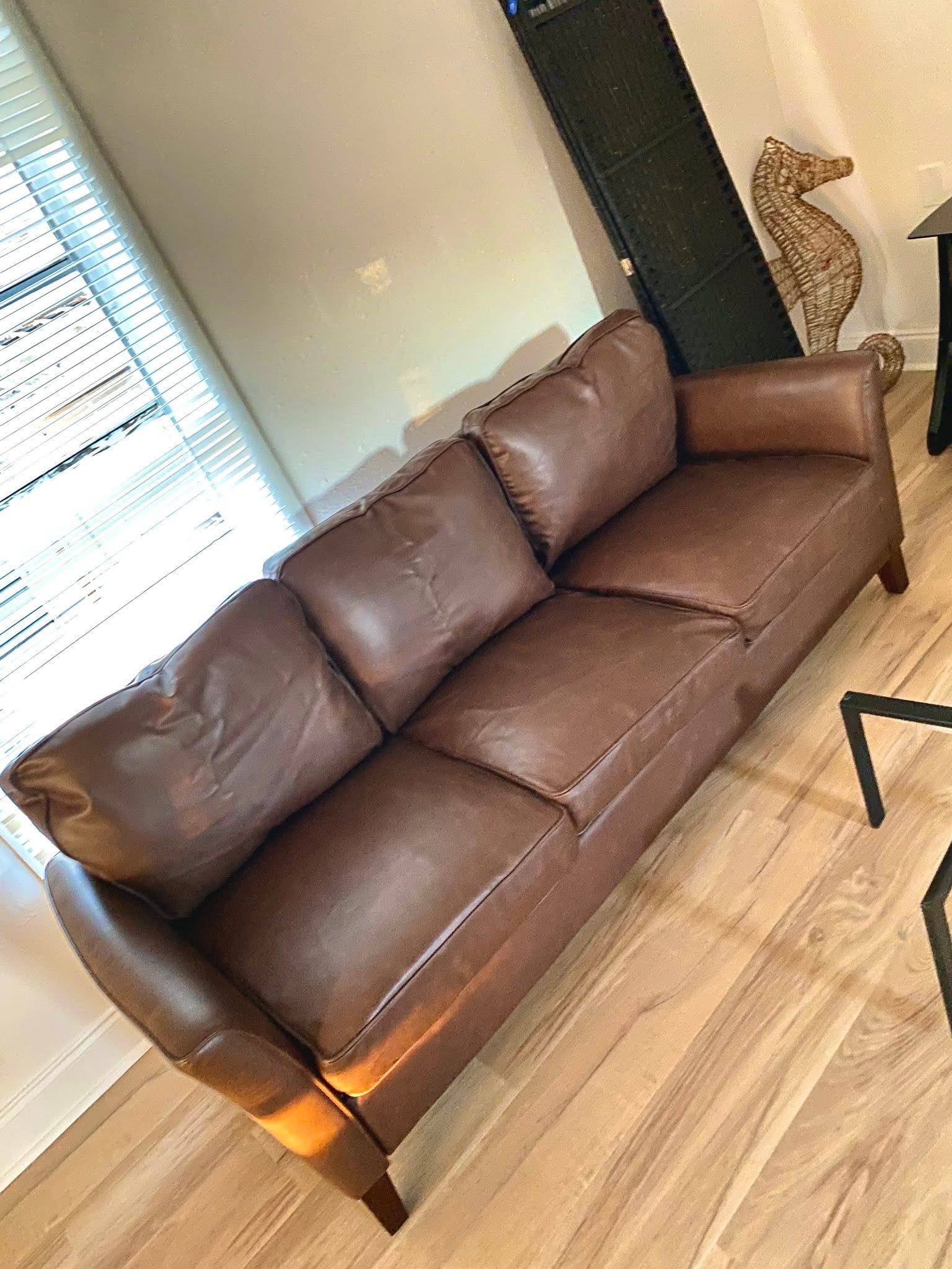 Completed sofa furniture assembly and room setup by Flourish Home Services