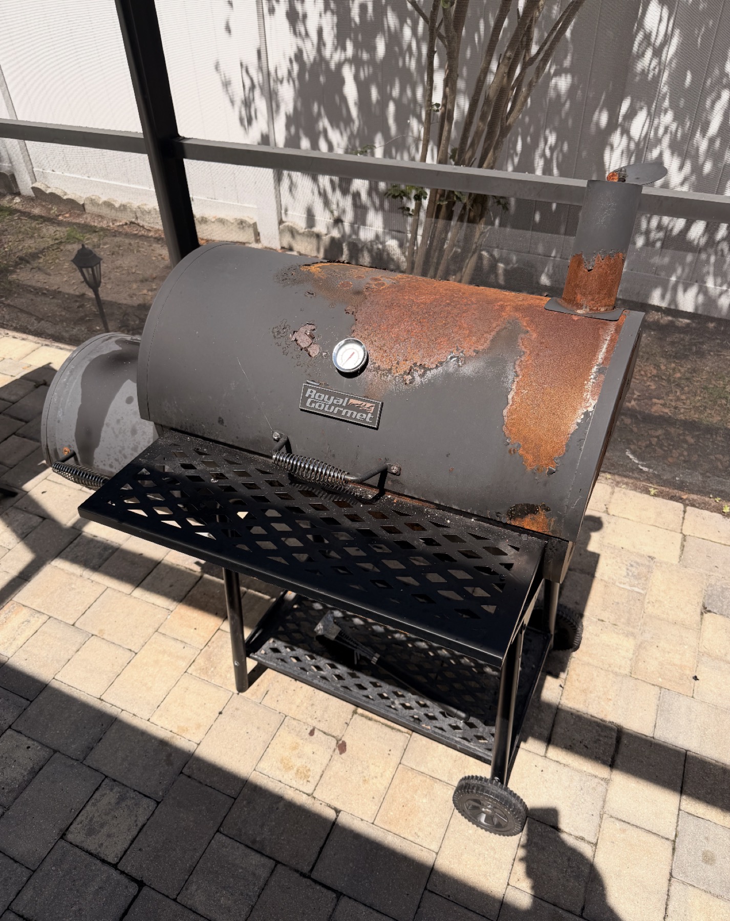 Before grill restoration for Tampa Bay property maintenance by Flourish Home Services